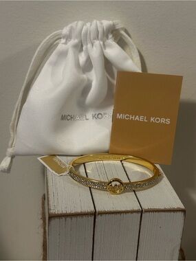 Michael Kors Gold Crystal Pavé MK Circle Logo Bangle Bracelet
Style # MKJH0008A7
